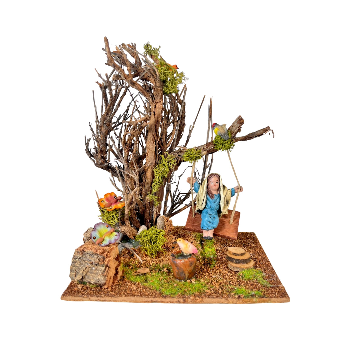 Belenes Artesanos - Árbol con columpio y niña de barro