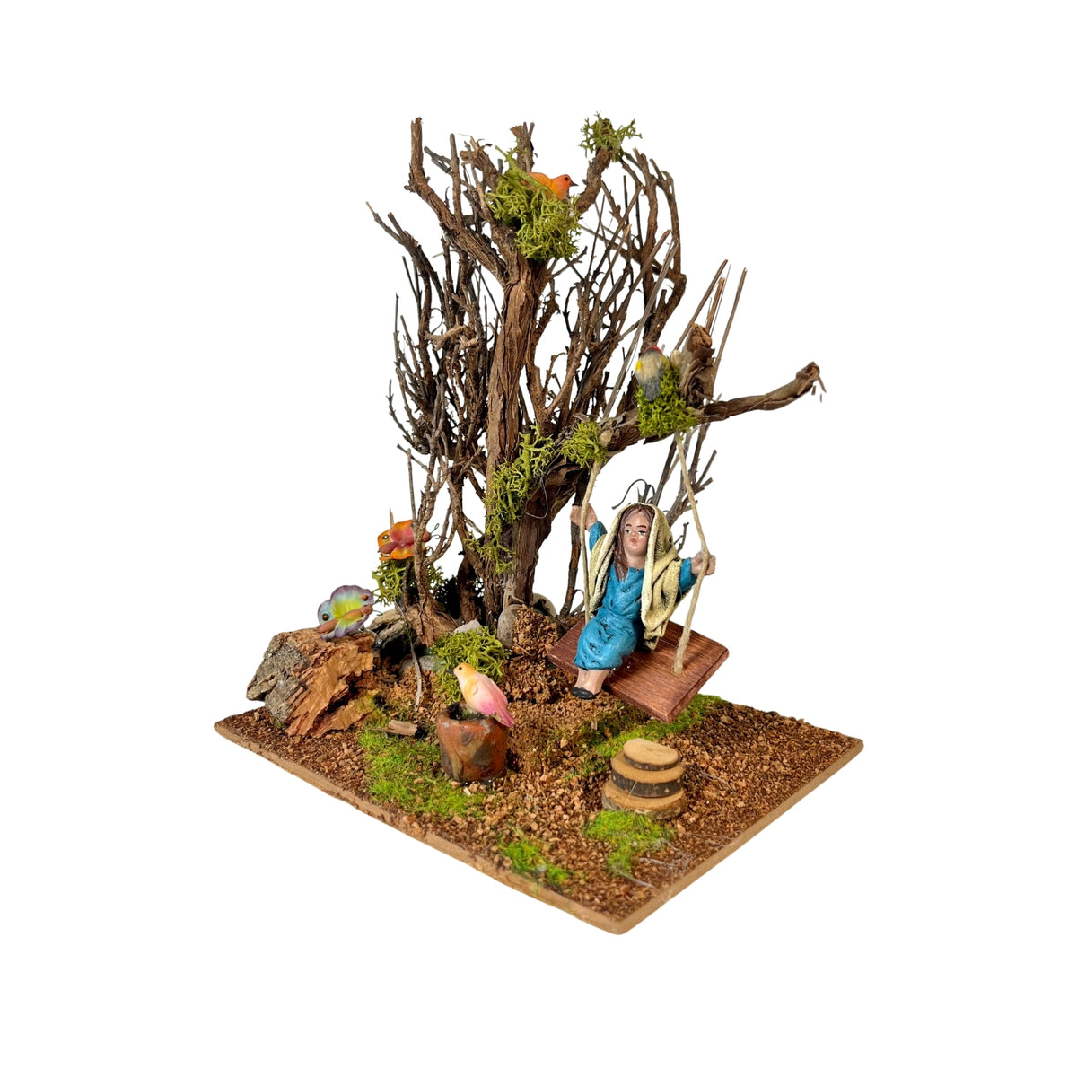 Belenes Artesanos - Árbol con columpio y niña de barro