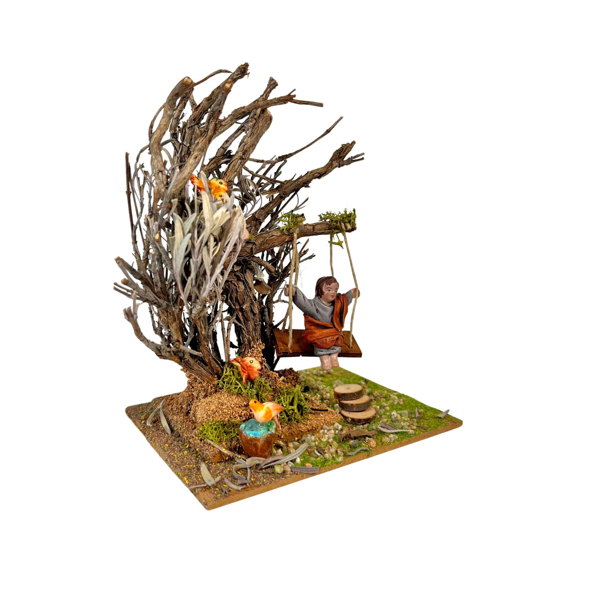 Belenes Artesanos - Árbol con columpio y niño de barro