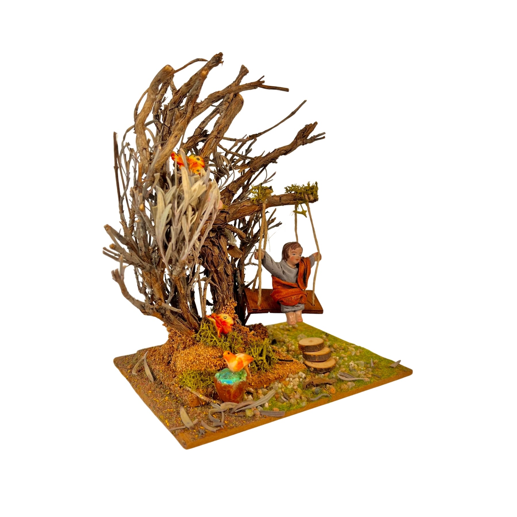 Belenes Artesanos - Árbol con columpio y niño de barro