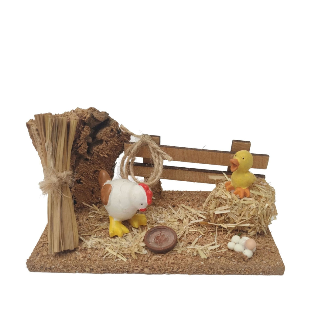Corral amb porc assegut