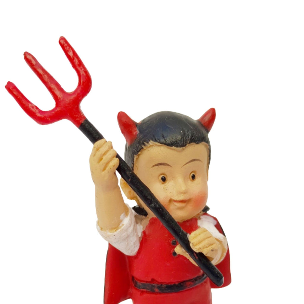 Diablo con horca, hacia arriba