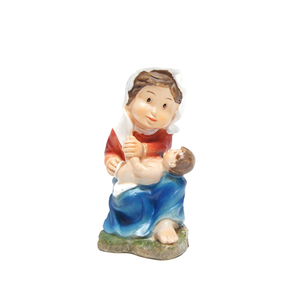 María o pastora limpiando al niño
