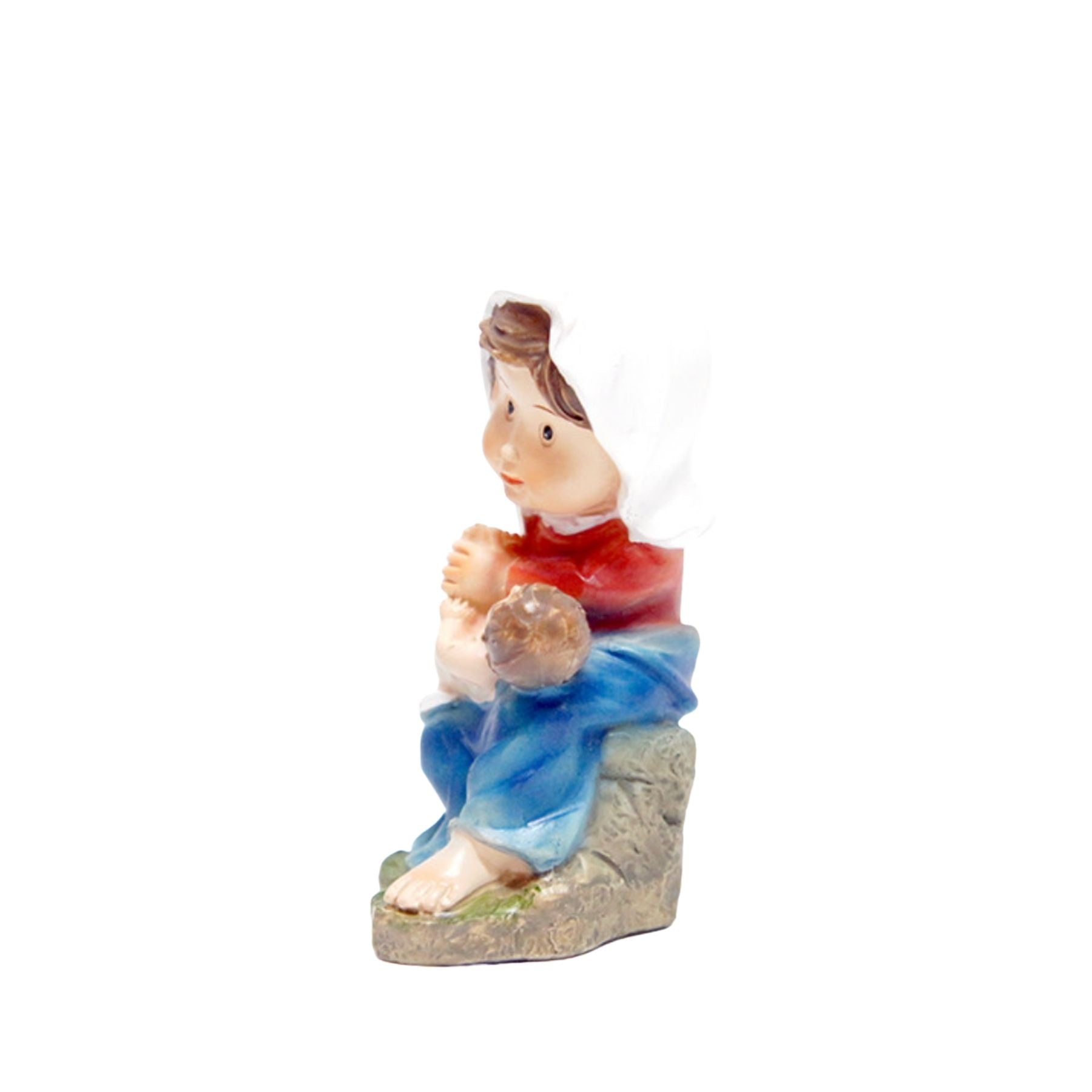 María o pastora limpiando al niño
