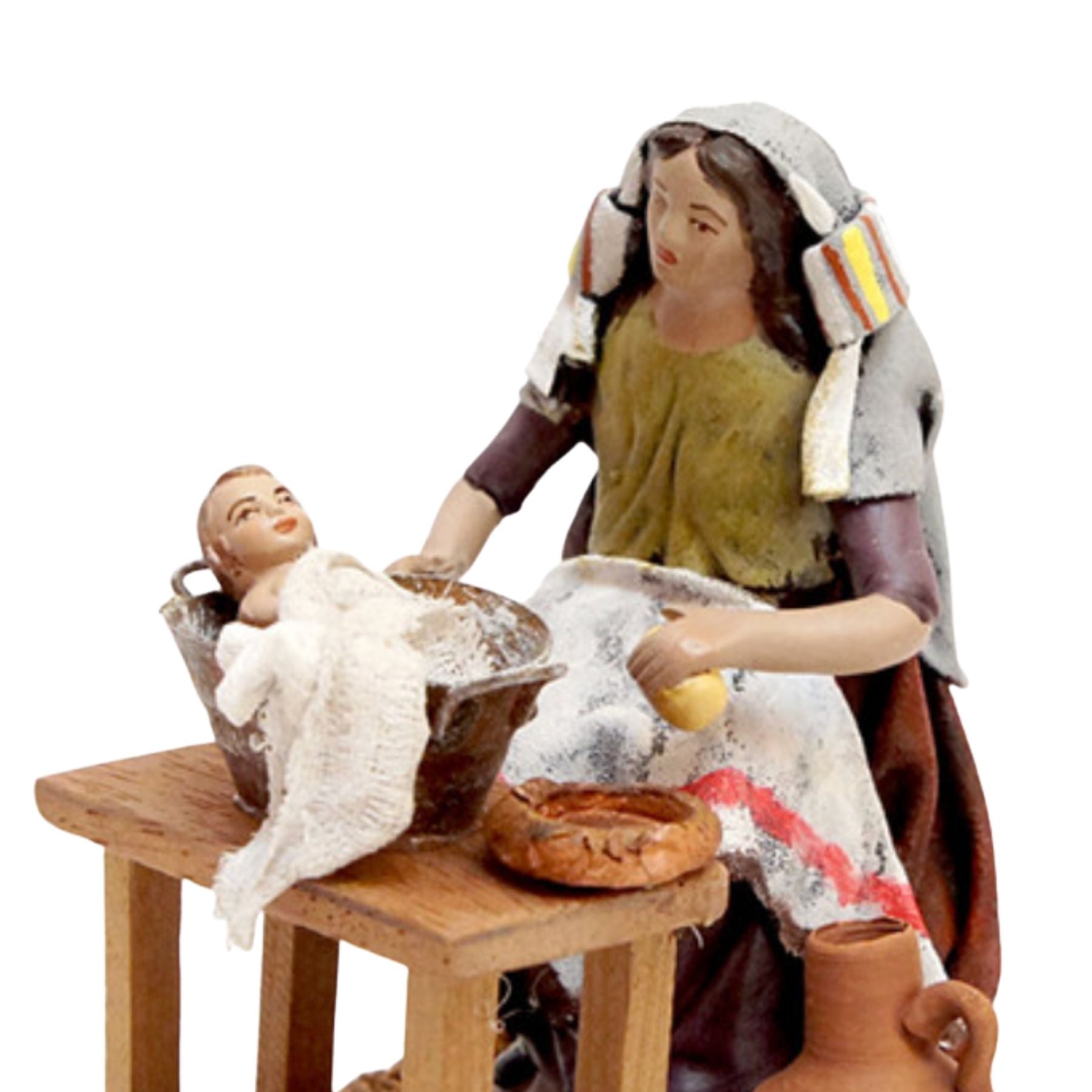 Belenes Artesanos - Mujer bañando bebe