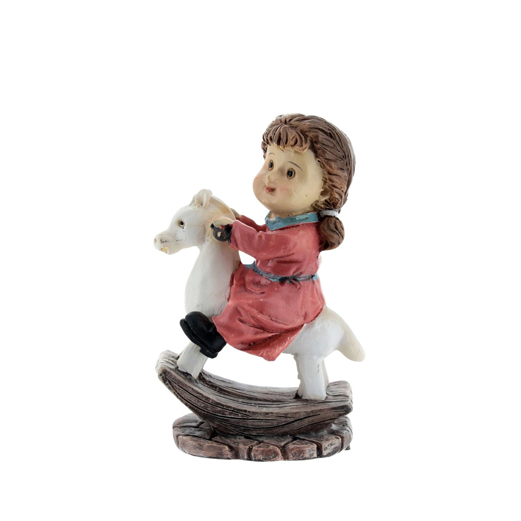 Niña con caballito